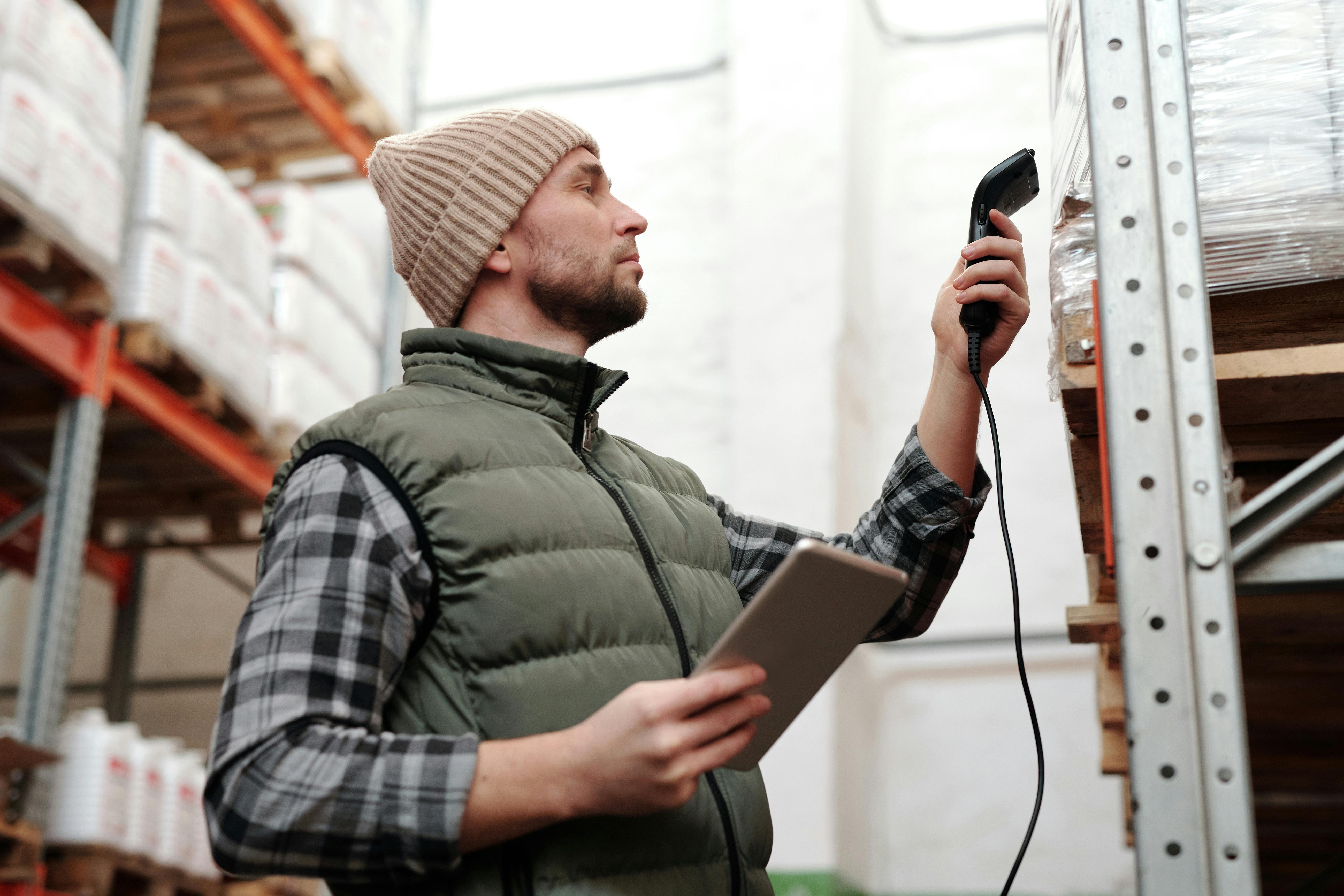 Warehouse worker using a barcode scanner